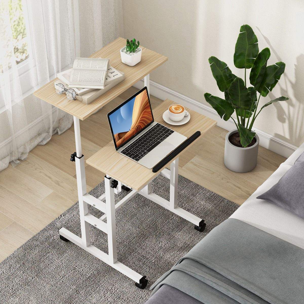 Sit-heis-skrivebord med hjul, vippebar topp i to nivåer